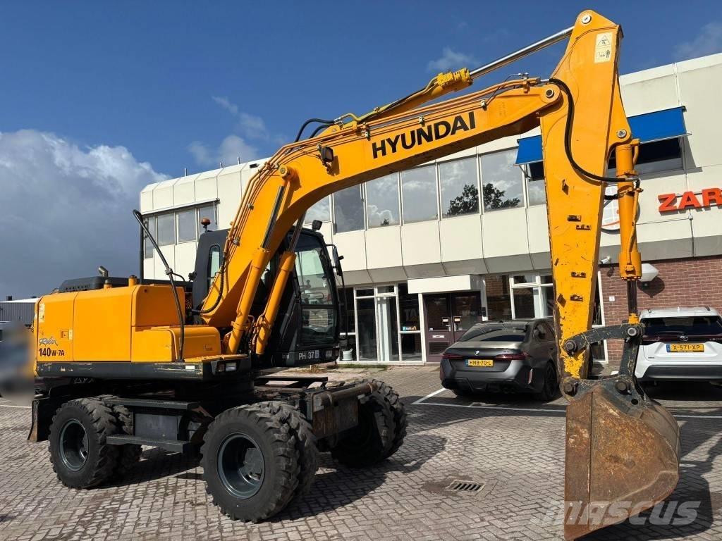 Hyundai 140W-7A Колёсные экскаваторы