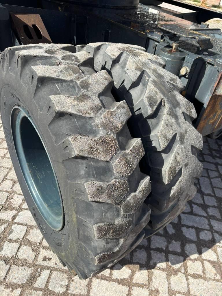 Hyundai 140W-7A Колёсные экскаваторы