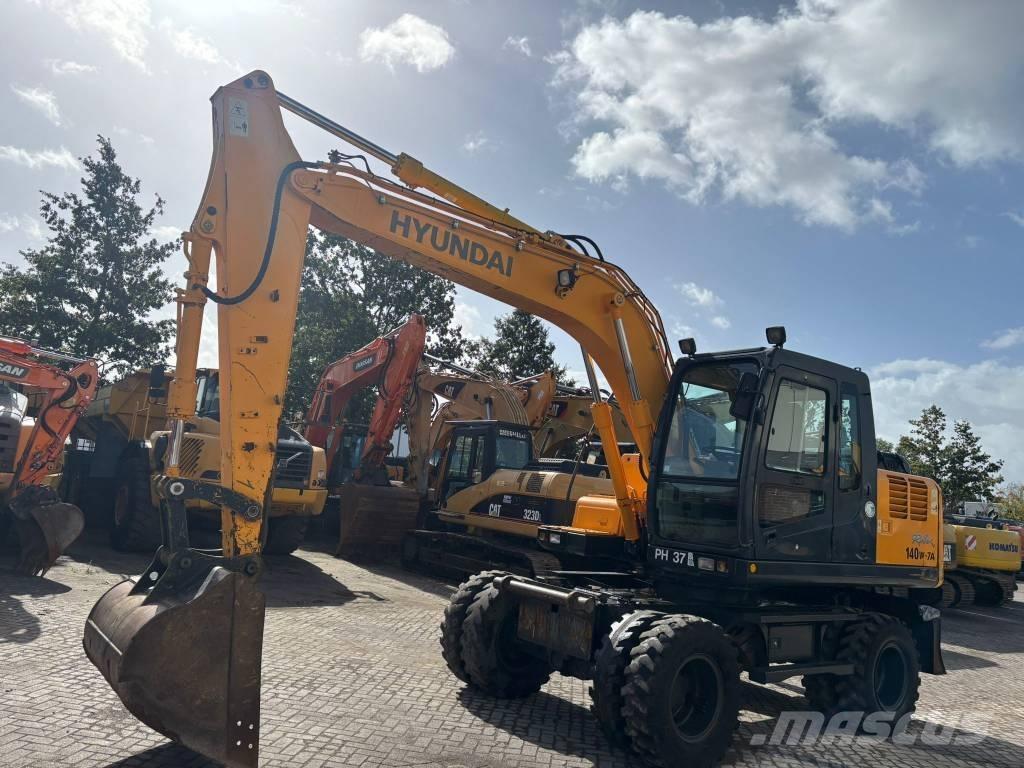 Hyundai 140W-7A Колёсные экскаваторы