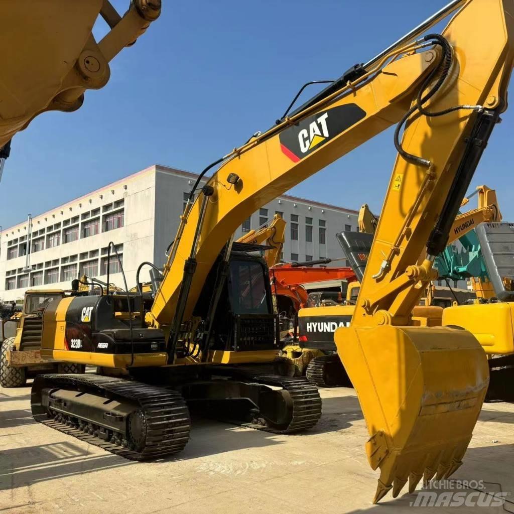 CAT 323 D L Гусеничные экскаваторы