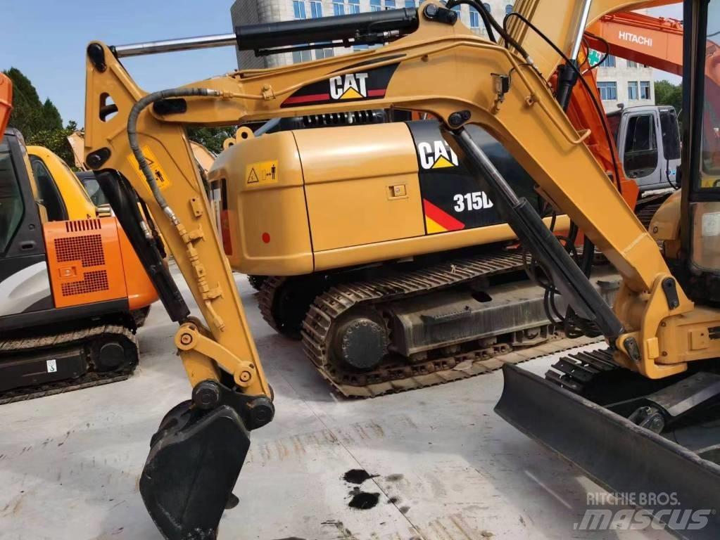 CAT 303c Мини-экскаваторы