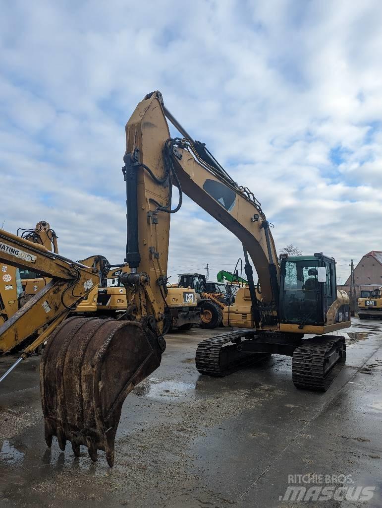 CAT 323 D Гусеничные экскаваторы