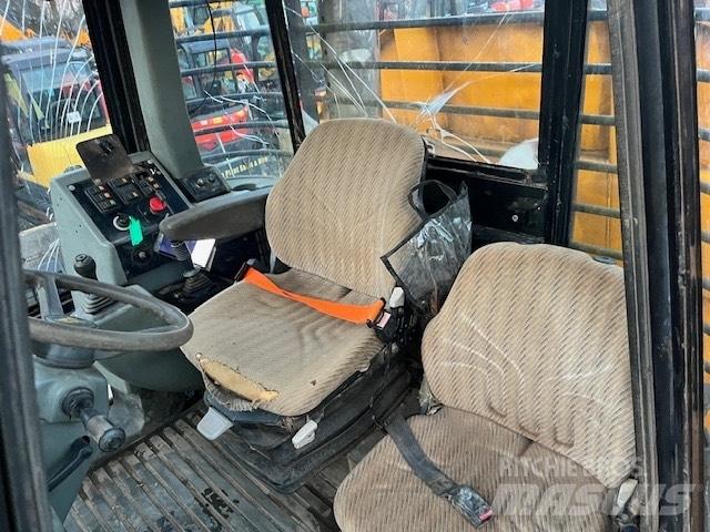 JCB 714 Шарнирно-сочленённые самосвалы