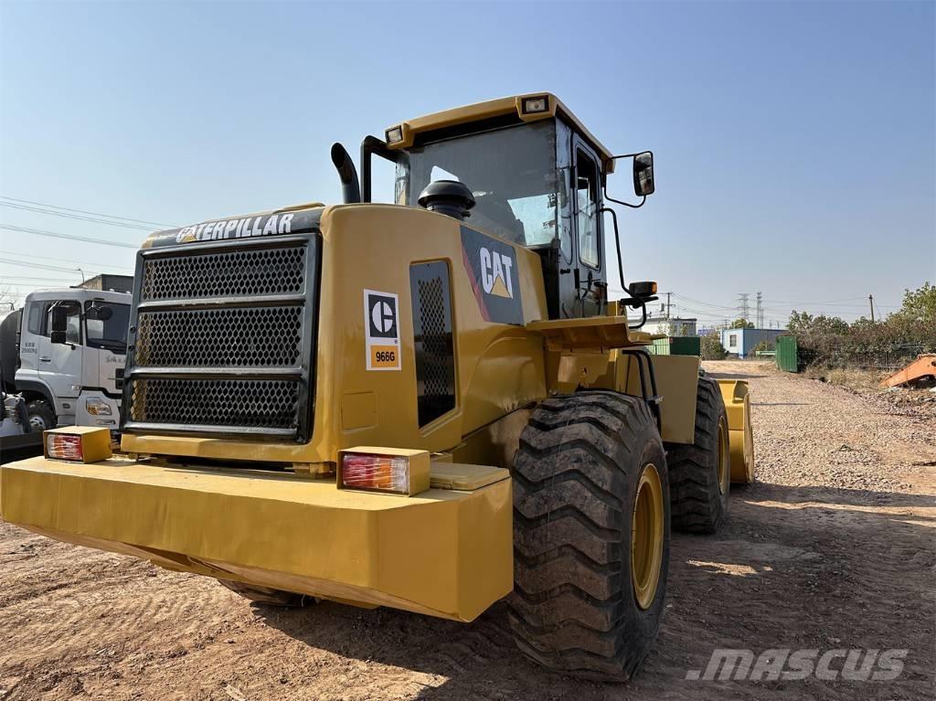 CAT 966G Фронтальные погрузчики