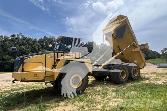 Komatsu HM400 Шарнирно-сочленённые самосвалы