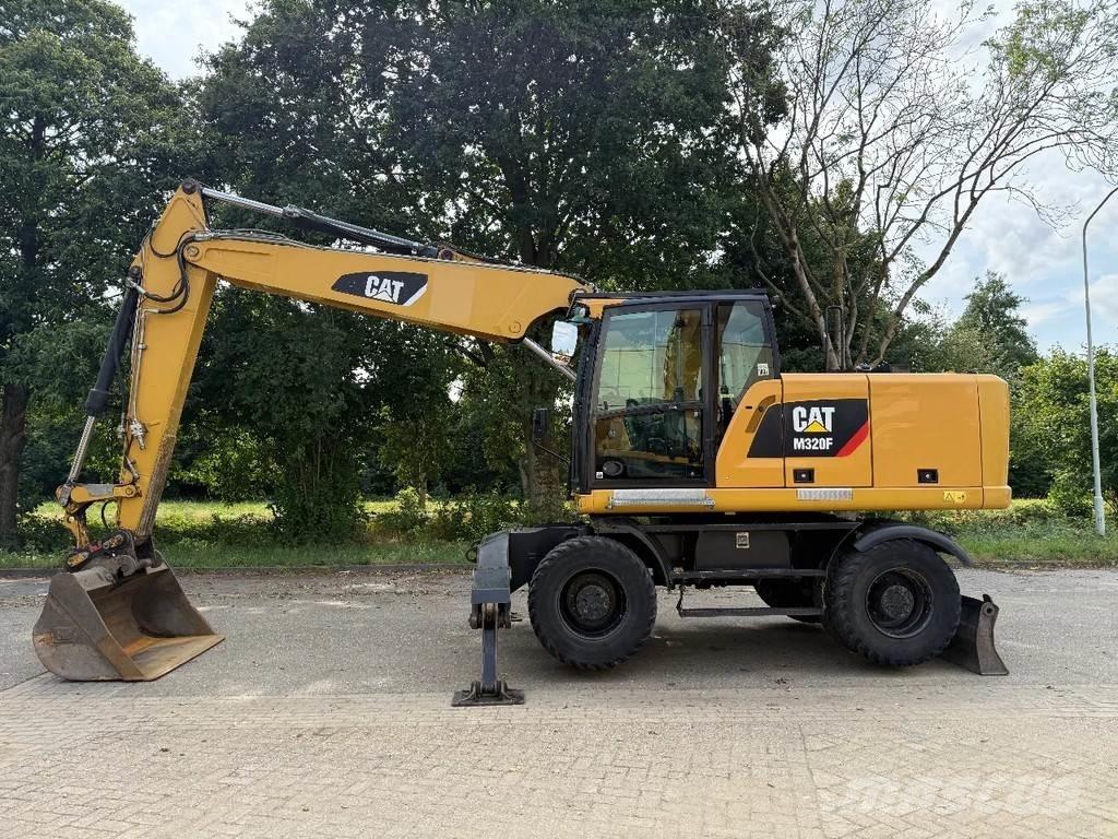 CAT M320F Колёсные экскаваторы