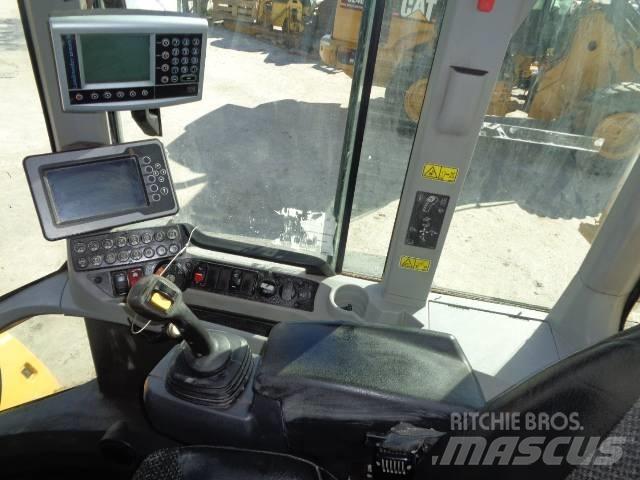 CAT 938M Фронтальные погрузчики
