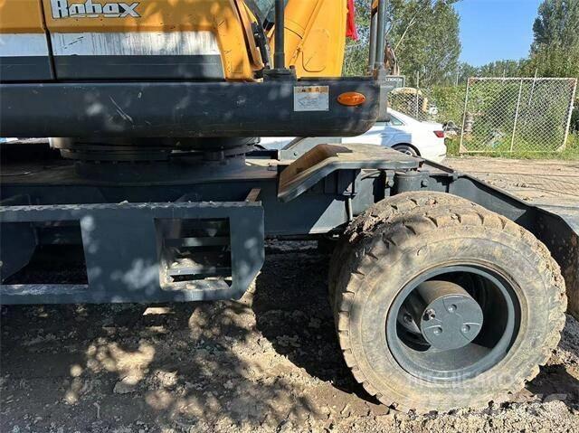 Hyundai 210W Колёсные экскаваторы