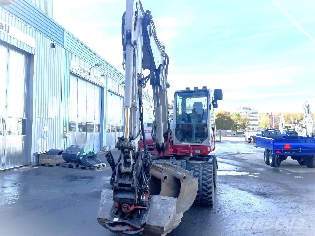 Takeuchi TB 295 W Колёсные экскаваторы