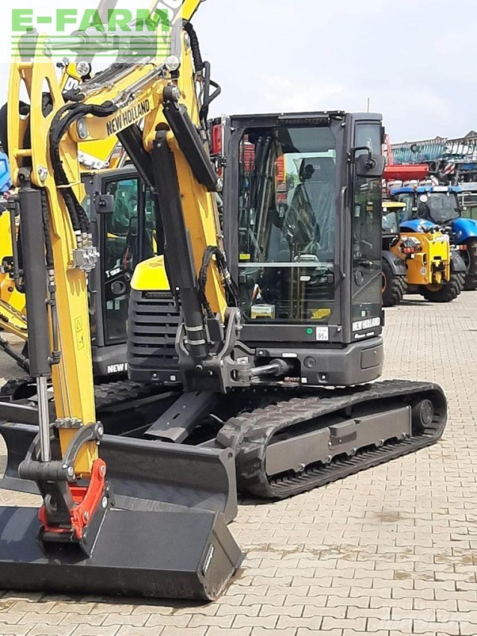 New Holland e65d Колёсные экскаваторы
