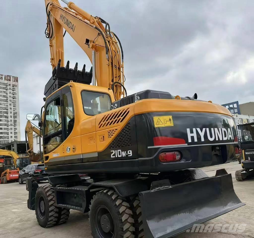 Hyundai 210W -9 Колёсные экскаваторы