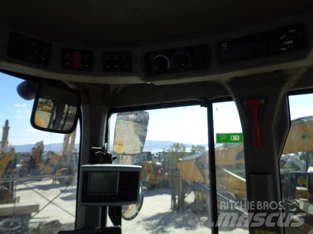 CAT 938M Фронтальные погрузчики