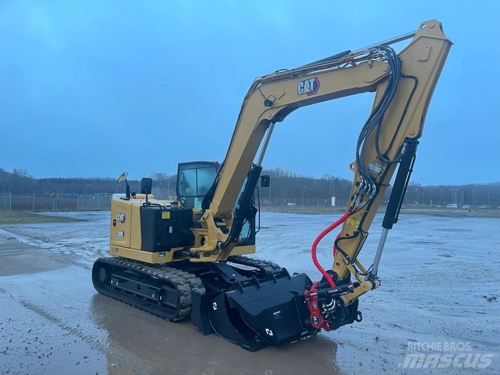 CAT 308 Малые экскаваторы 7т-12т