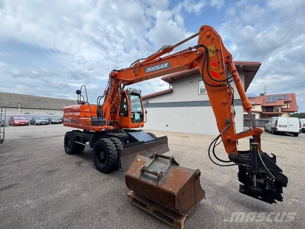 Doosan DX 140 W Колёсные экскаваторы