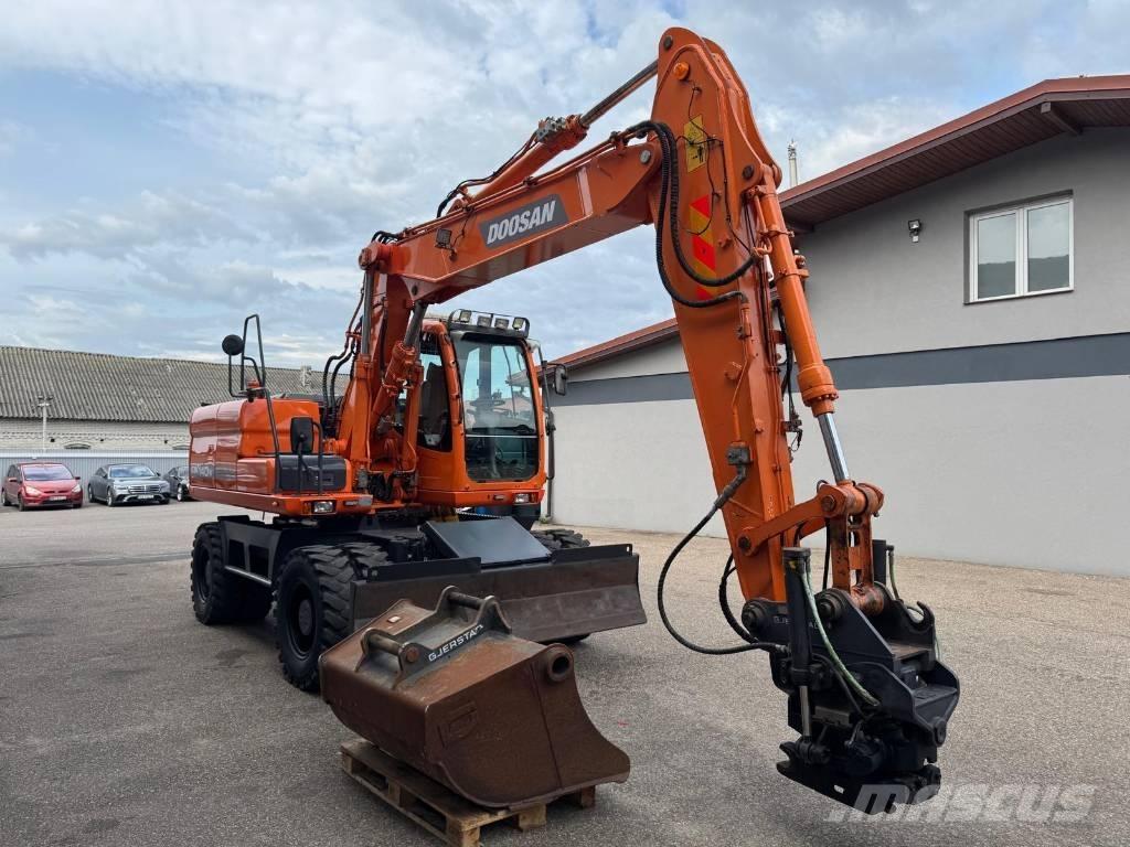 Doosan DX 140 W Колёсные экскаваторы