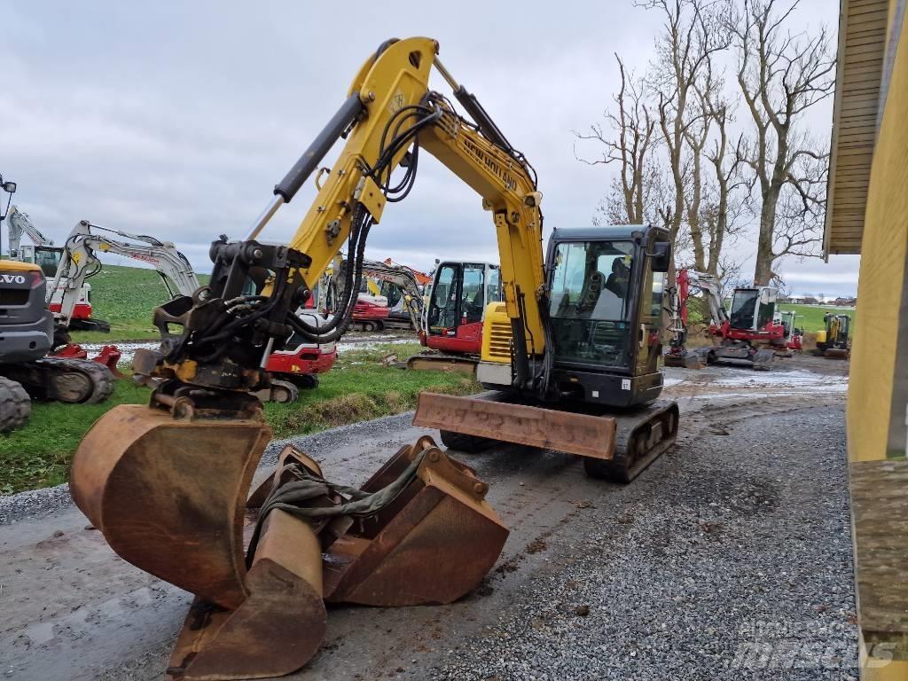 New Holland E60C Мини-экскаваторы