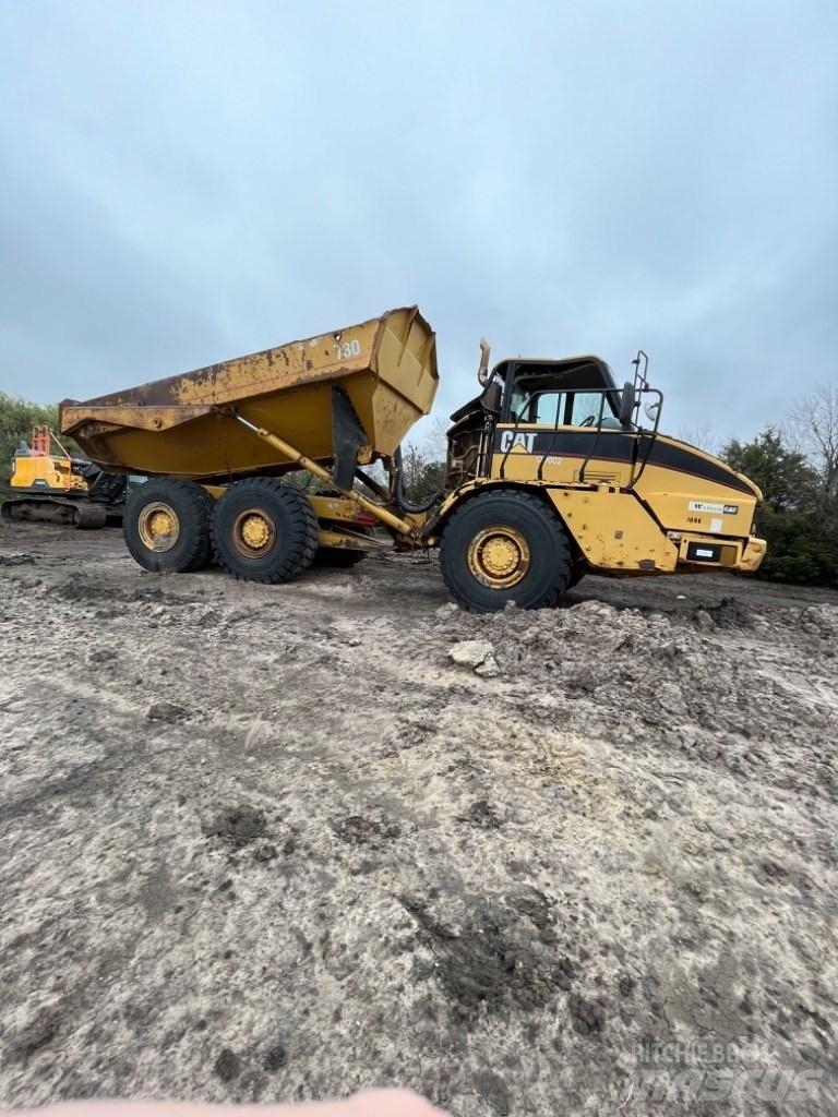 CAT 730 Шарнирно-сочленённые самосвалы