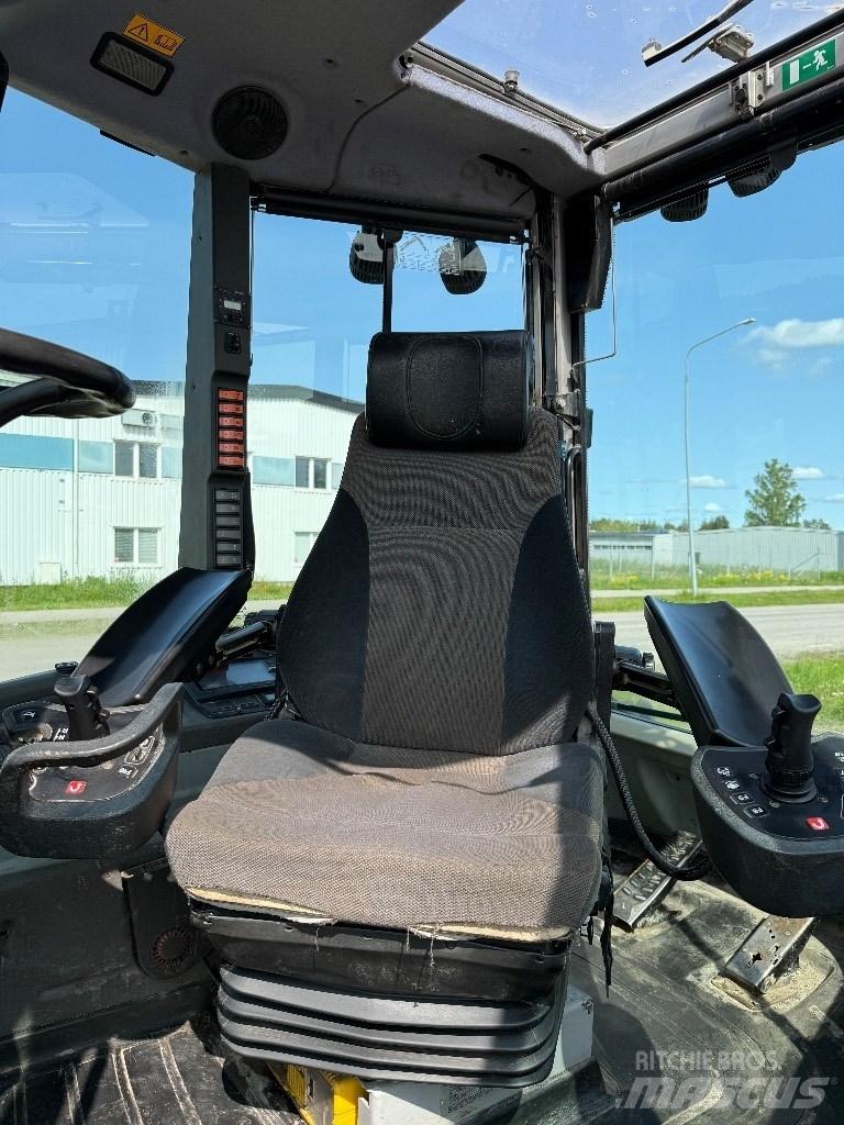 Huddig 1260 C Экскаваторы-погрузчики