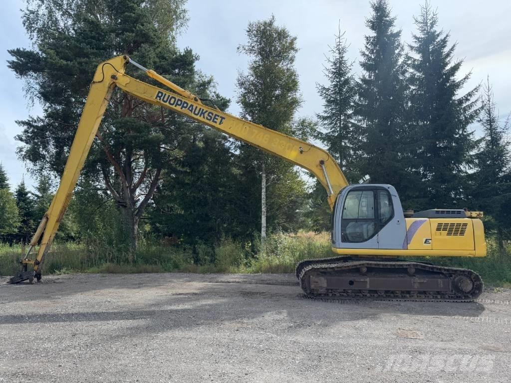 New Holland E 215 Экскаваторы с большим вылетом