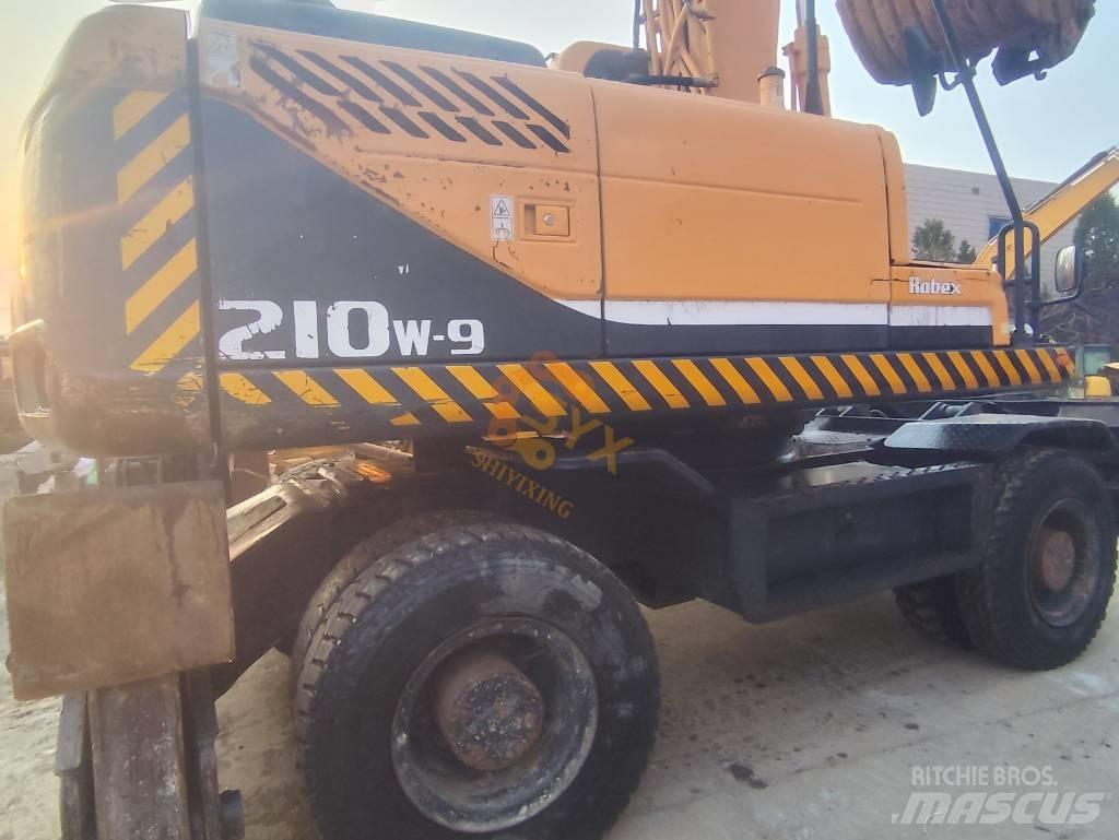 Hyundai 210W-9 Колёсные экскаваторы