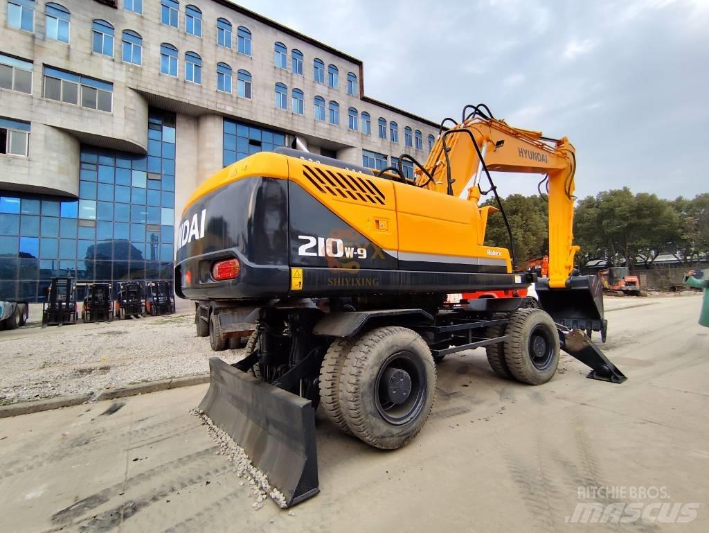 Hyundai 210W-9 Колёсные экскаваторы