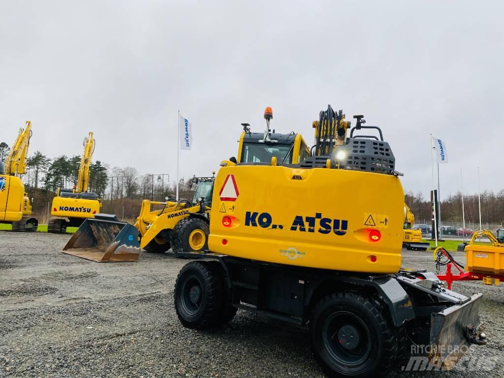 Komatsu PW148-11 Колёсные экскаваторы