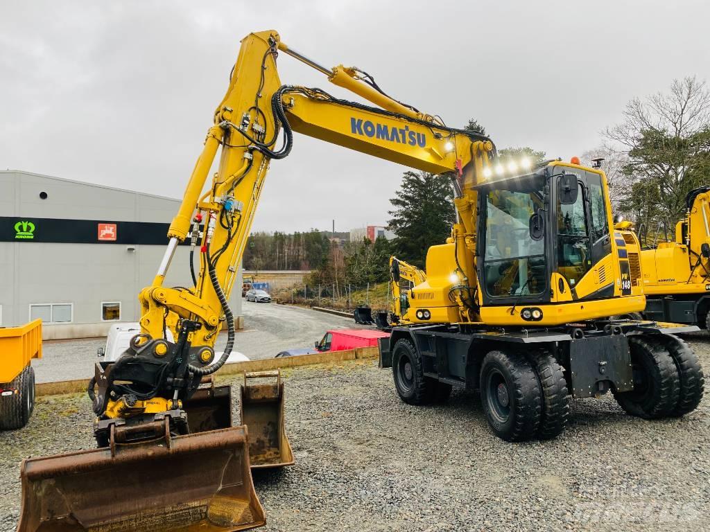 Komatsu PW148-11 Колёсные экскаваторы