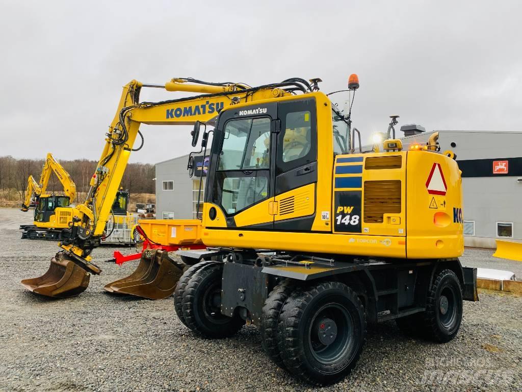 Komatsu PW148-11 Колёсные экскаваторы
