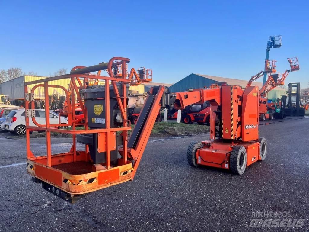 JLG E300AJP Коленчатые подъемники