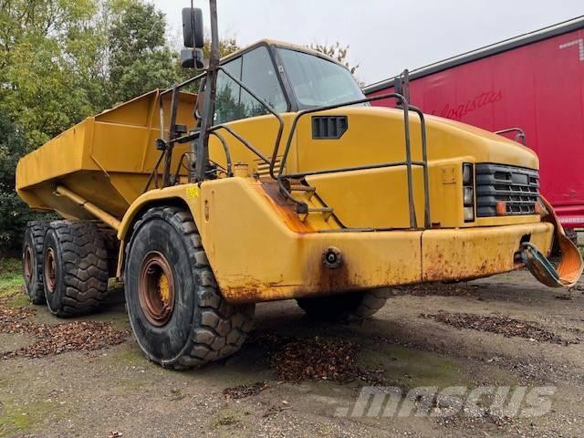 CAT 740 Шарнирно-сочленённые самосвалы