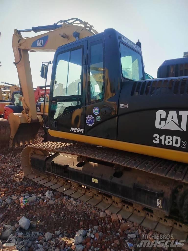 CAT 318 Гусеничные экскаваторы