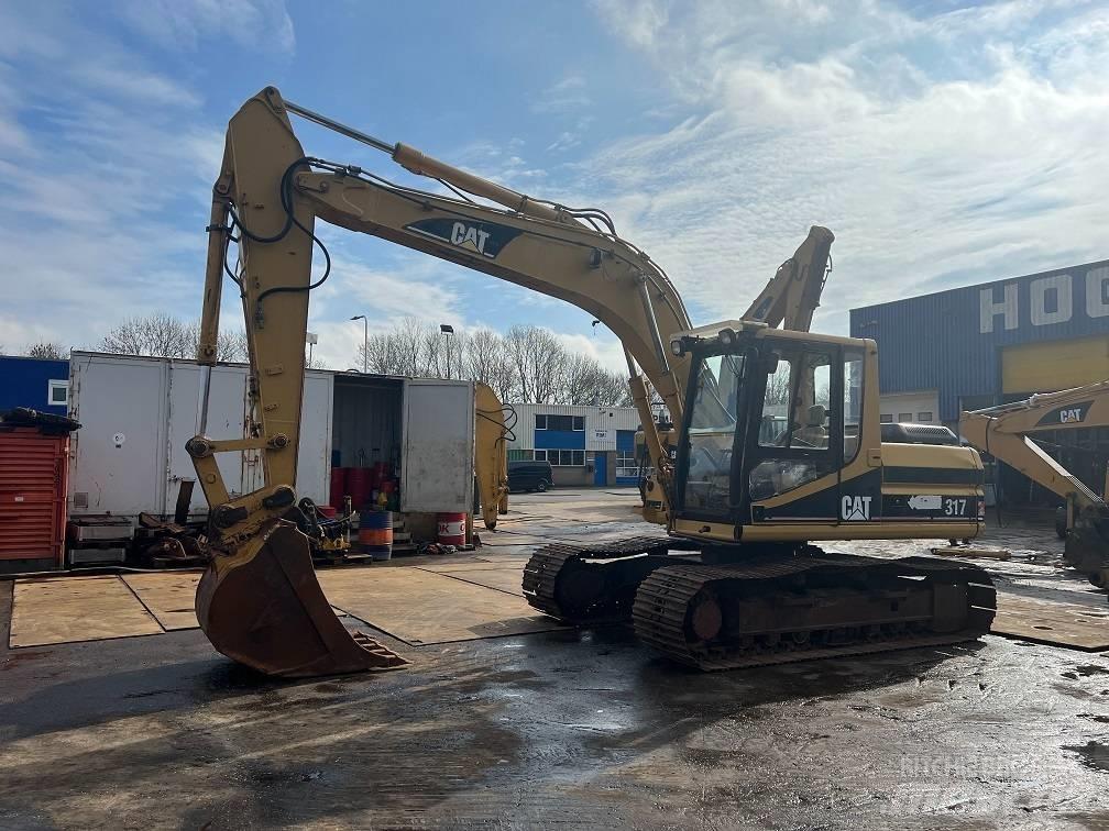 CAT 317 Гусеничные экскаваторы
