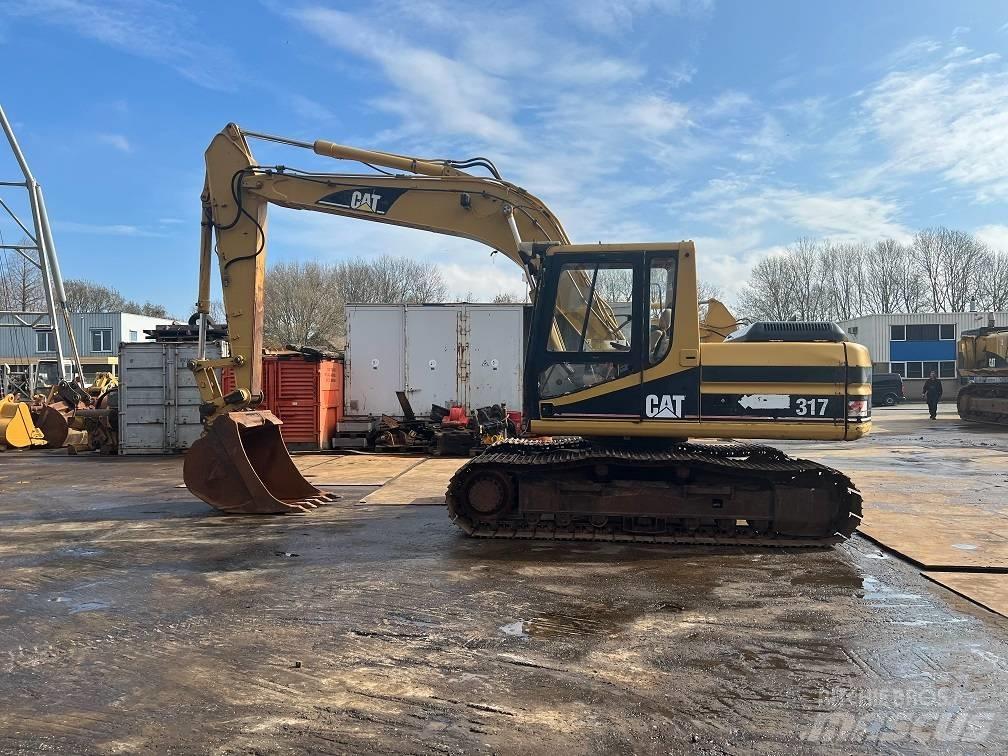 CAT 317 Гусеничные экскаваторы