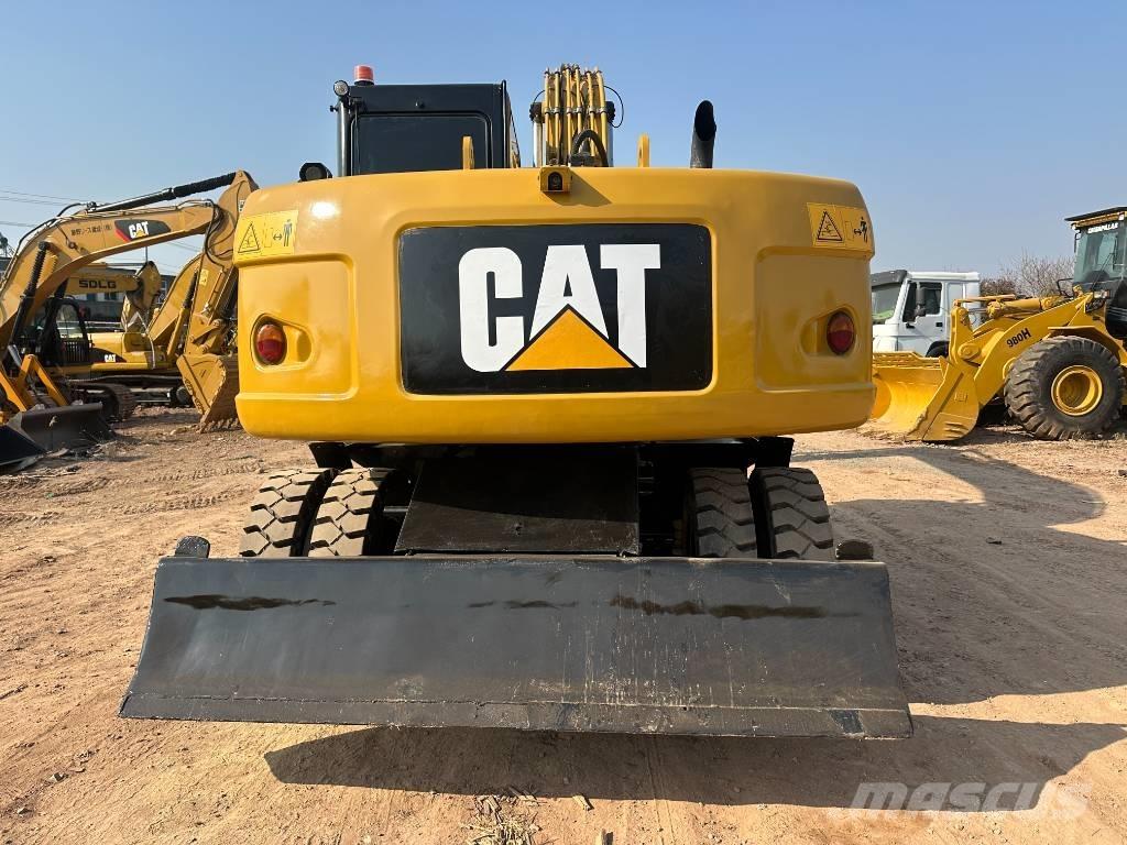 CAT M 320D Колёсные экскаваторы