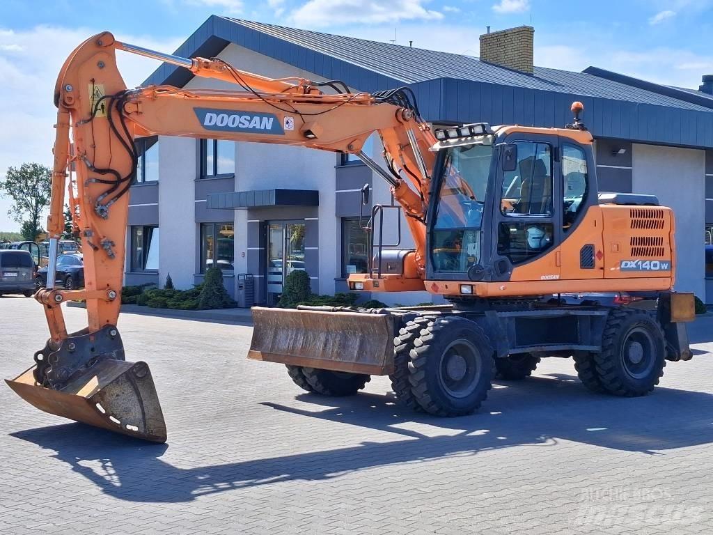 Doosan DX 140 W-3 Колёсные экскаваторы