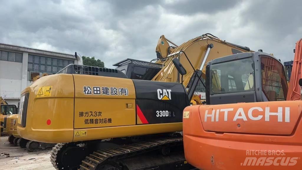 CAT CAT330D2L Малые экскаваторы 7т-12т