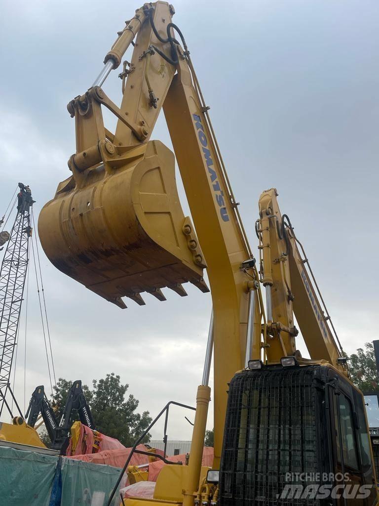 Komatsu PC210-10MO Гусеничные экскаваторы