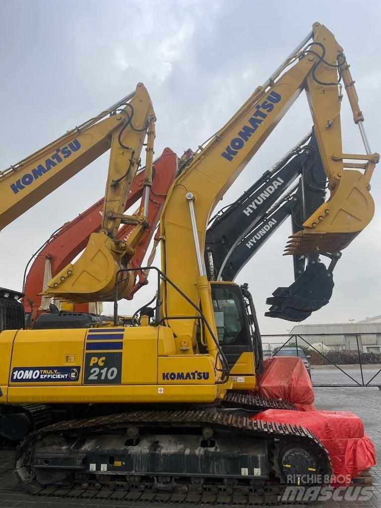 Komatsu PC210-10MO Гусеничные экскаваторы