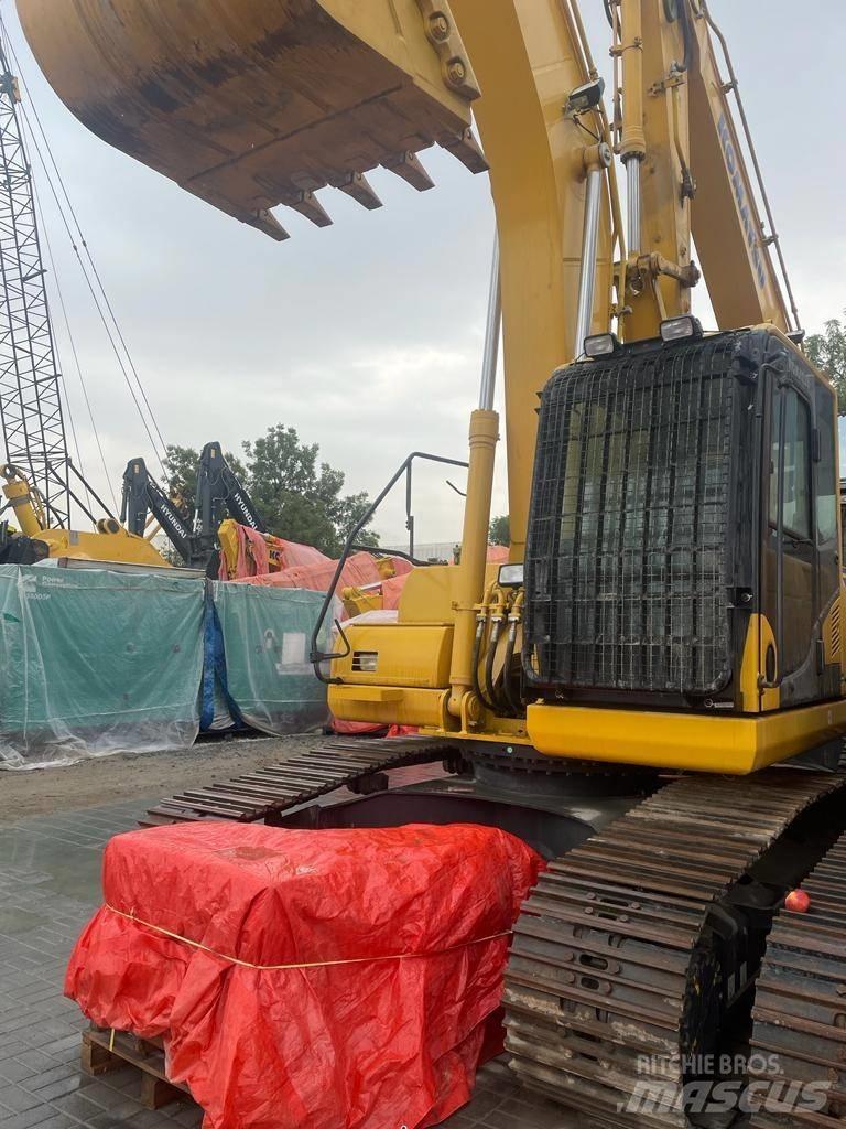 Komatsu PC210-10MO Гусеничные экскаваторы