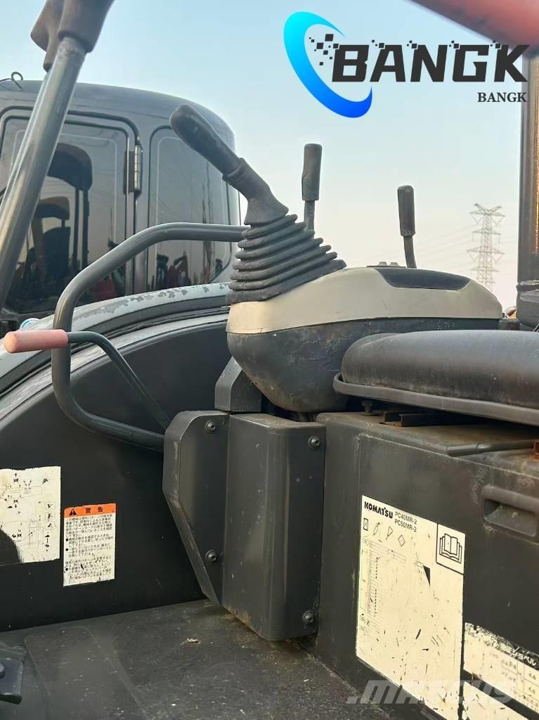 KOMΛ1‘SU PC40-MR Гусеничные экскаваторы