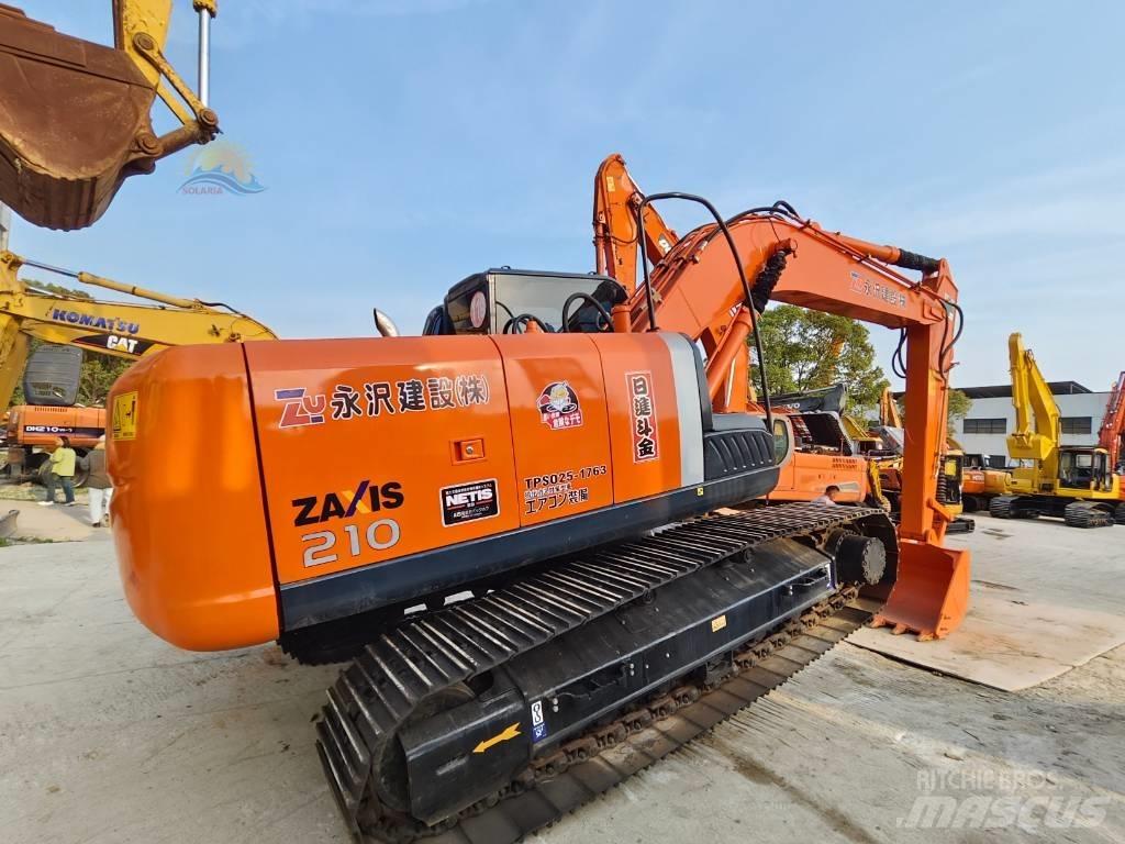 Hitachi ZX 210 Гусеничные экскаваторы