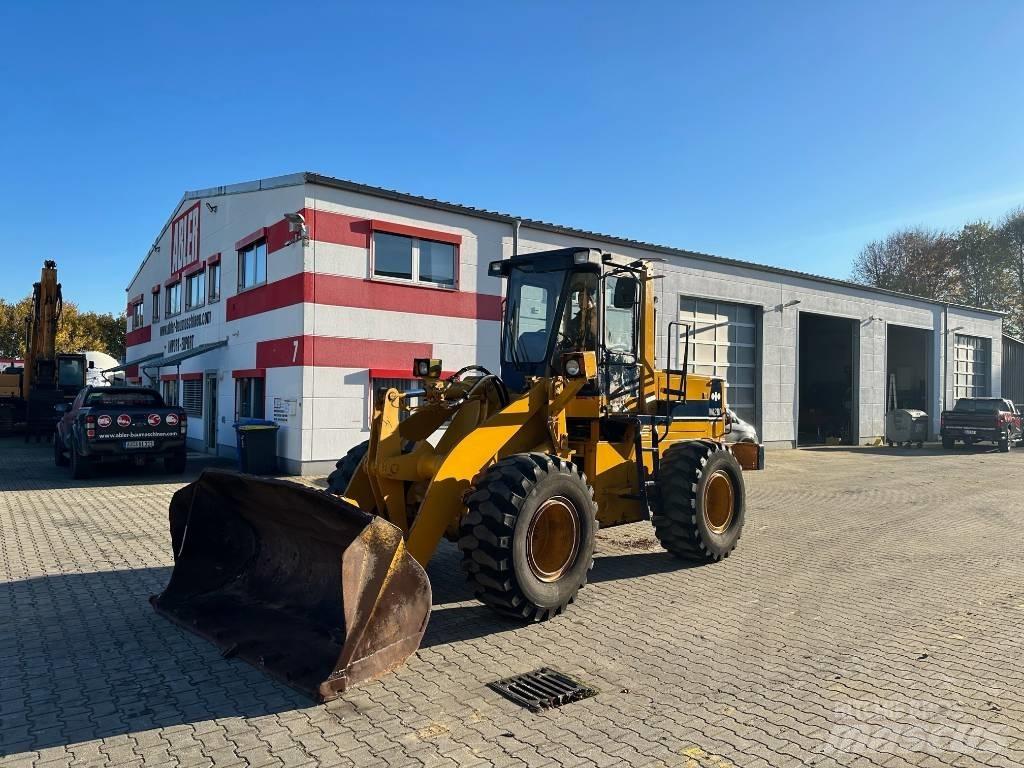 Komatsu WA200 Фронтальные погрузчики