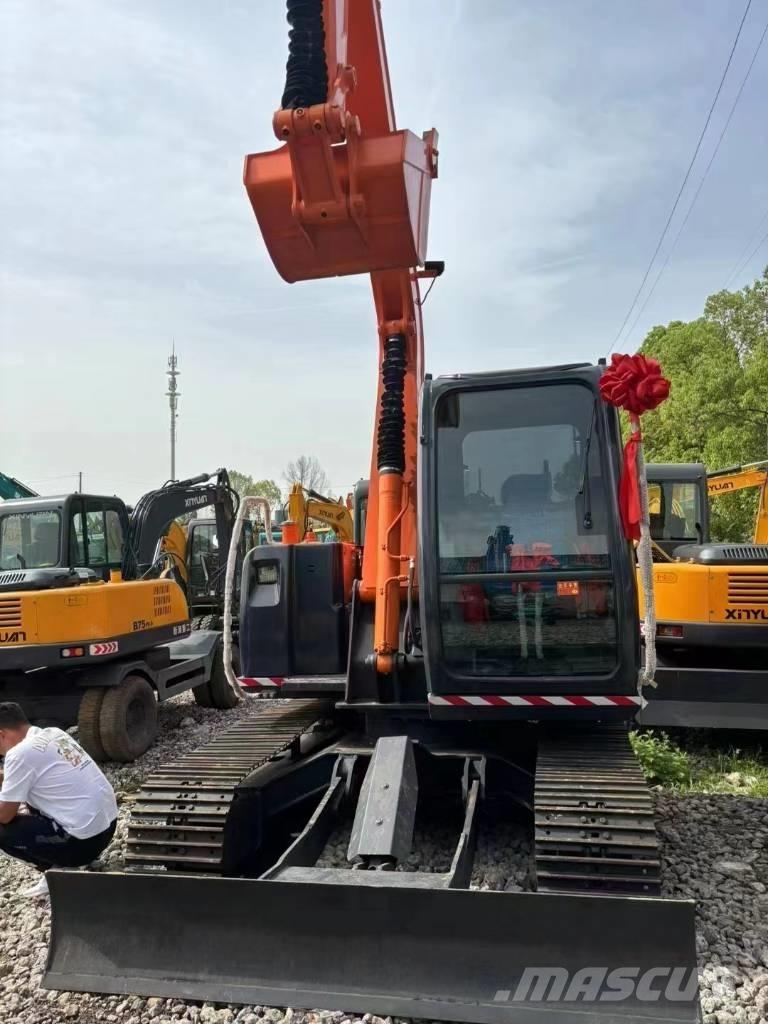 Hitachi ZX 70 Гусеничные экскаваторы