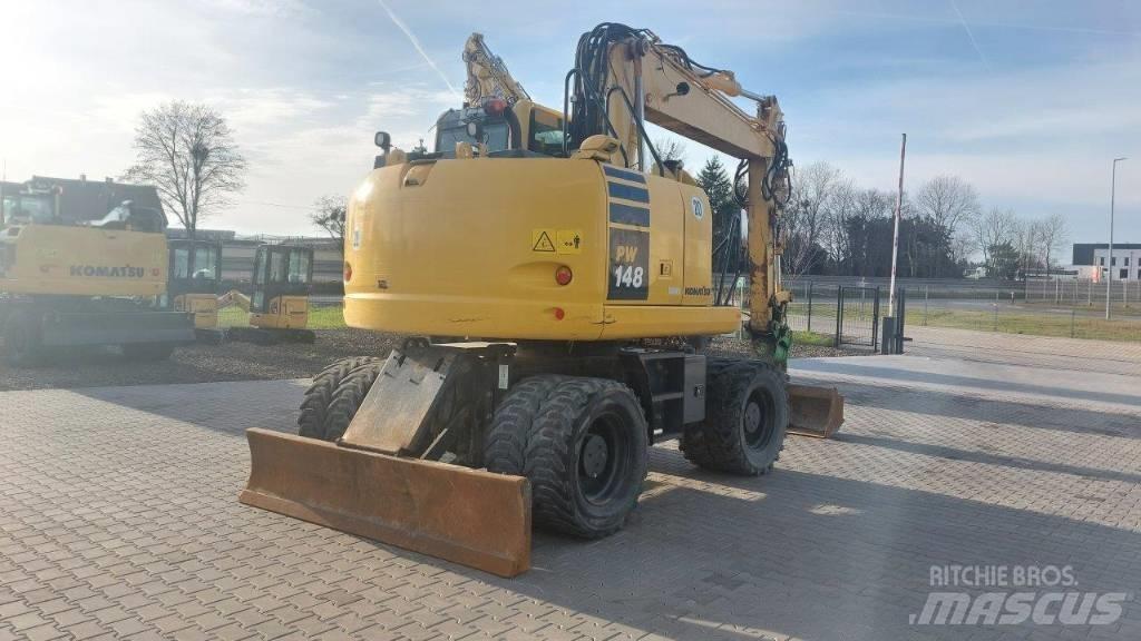 Komatsu PW 148-10 Колёсные экскаваторы