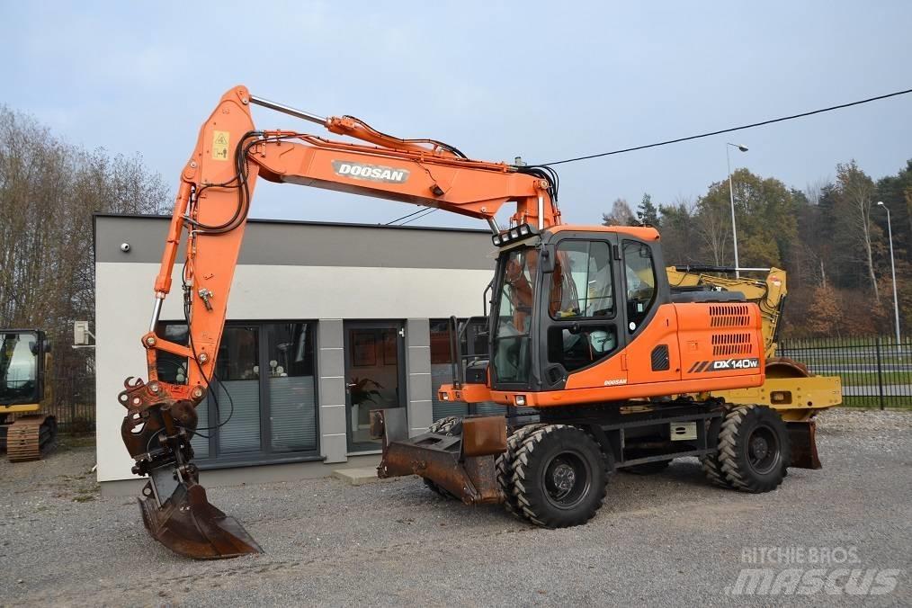 Doosan DX 140 W Колёсные экскаваторы