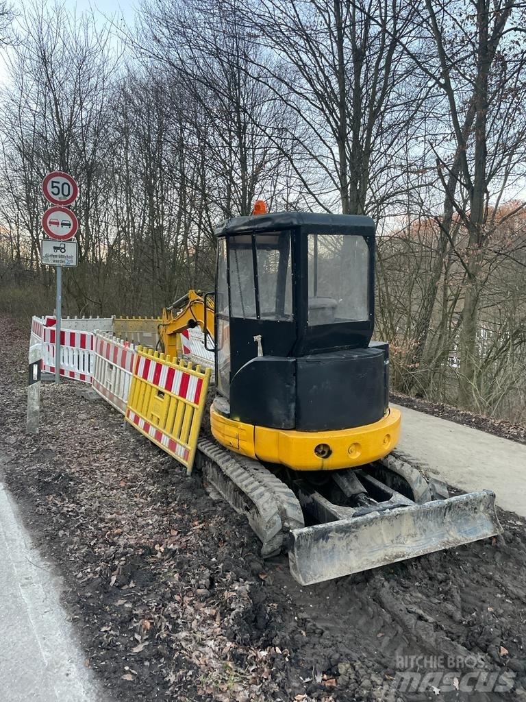 CAT 303 CR Мини-экскаваторы