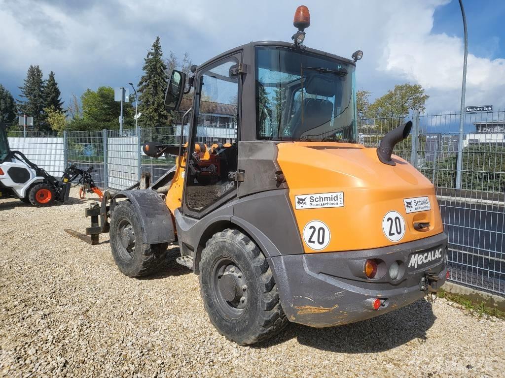Mecalac AX 700 Фронтальные погрузчики