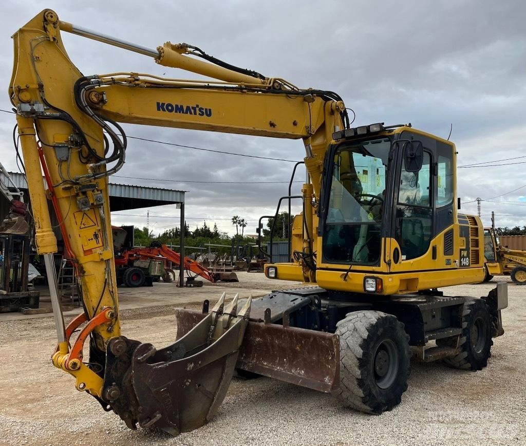 Komatsu PW148-8 Колёсные экскаваторы