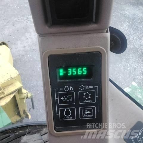 John Deere 6610 Самоходные кормоуборочные комбайны