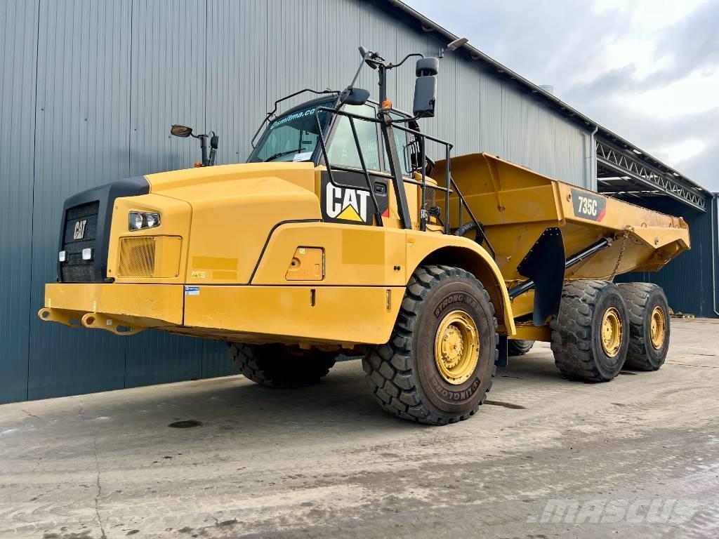 CAT 735C Шарнирно-сочленённые самосвалы